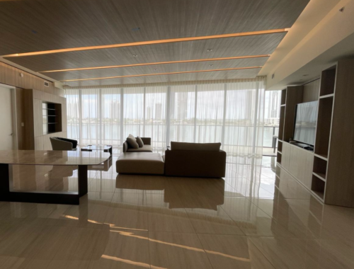 luxury-interior-remodeling-project-featuring-modern-recessed-ceiling-lighting-polished-stone-floors-and-custom-built-in-cabinetry-completed-by-a-general-contractor-miami-fl