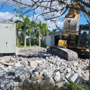 commercial-demolition-services-miami-fl-excavator-clearing-concrete-debris
