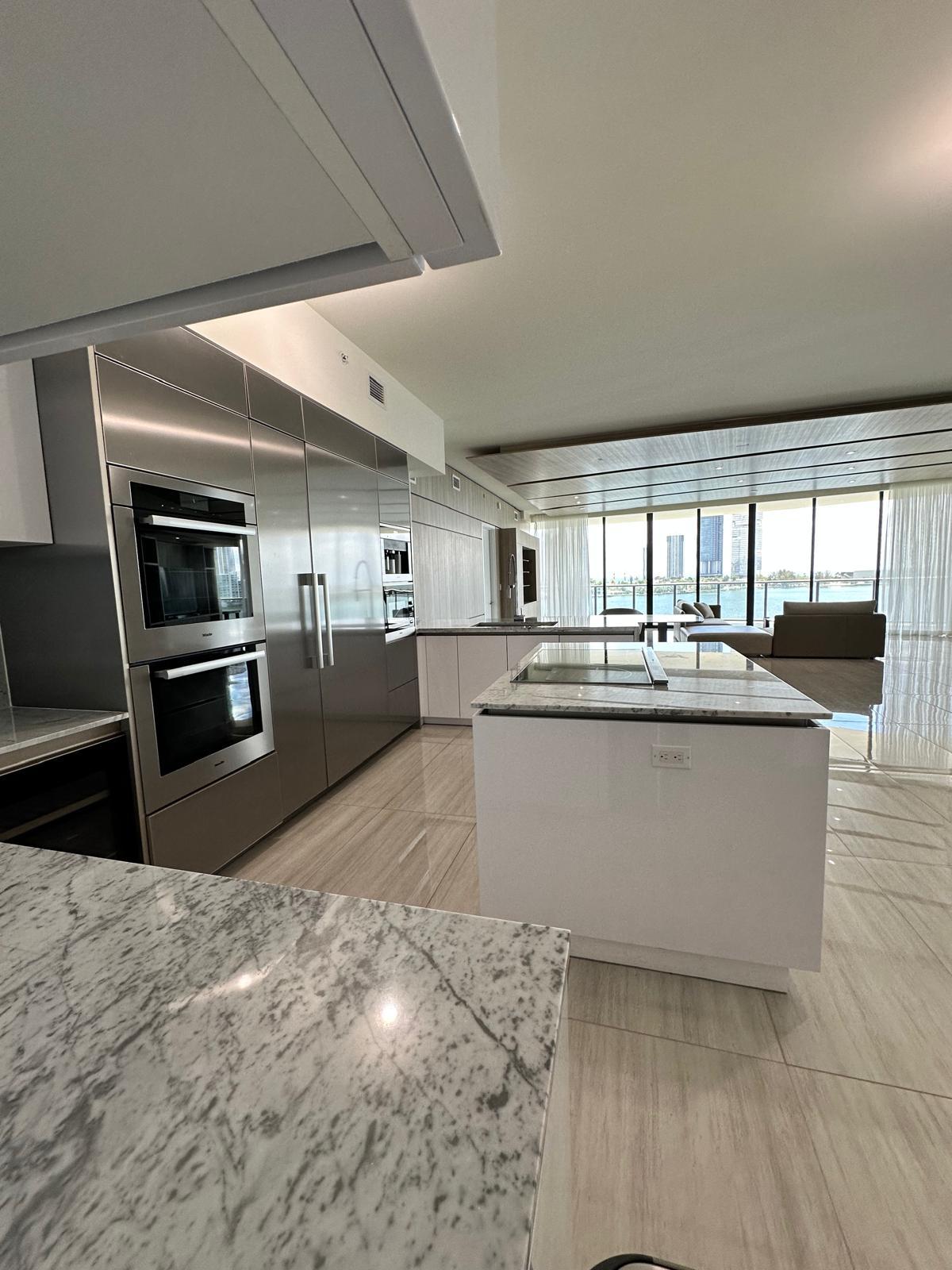 Kitchen remodeling project with quartz countertops, modern cabinetry, and open layout