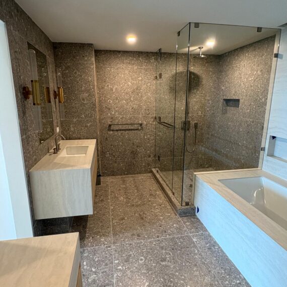 Luxury bathroom remodel in South Florida featuring walk-in shower and glass enclosure